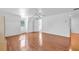 Spacious bedroom with hardwood floors and an open door to another room at 17402 Billiar Ave, Port Charlotte, FL 33948