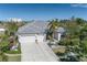 Single-Gathering home with a two-car garage and manicured landscaping at 1929 24Th Street W Cir, Palmetto, FL 34221