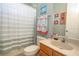 Bathroom with shower/tub combo, toilet and vanity at 1929 24Th Street W Cir, Palmetto, FL 34221
