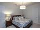 Bedroom with a king-size bed and dark wood furniture at 1929 24Th Street W Cir, Palmetto, FL 34221