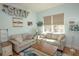 Light and airy living room with two sofas and a coffee table at 1929 24Th Street W Cir, Palmetto, FL 34221