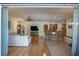 Open concept living room and kitchen with hardwood floors at 1929 24Th Street W Cir, Palmetto, FL 34221