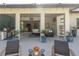 Covered patio features outdoor kitchen and lounge area at 1929 24Th Street W Cir, Palmetto, FL 34221