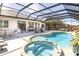 Large pool and spa with covered patio at 1929 24Th Street W Cir, Palmetto, FL 34221