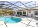 Expansive pool and spa with covered patio at 1929 24Th Street W Cir, Palmetto, FL 34221