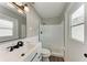 Clean and modern bathroom with a walk-in shower, white vanity, and stylish fixtures at 2211 41St W St, Bradenton, FL 34205