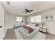 Spacious bedroom with a plush bed, neutral decor, and ample natural light at 2211 41St W St, Bradenton, FL 34205