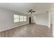 Bright living room featuring hardwood floors and ceiling fan at 2211 41St W St, Bradenton, FL 34205