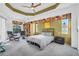 Spacious main bedroom with large windows and a sitting area at 23159 Allen Ave, Punta Gorda, FL 33980