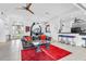 Open concept living area with kitchen, dining and patio access at 23159 Allen Ave, Punta Gorda, FL 33980