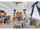 Home office features built-in shelving and comfortable seating at 23159 Allen Ave, Punta Gorda, FL 33980