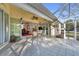 Spacious screened patio with view of the backyard at 23159 Allen Ave, Punta Gorda, FL 33980