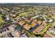 Aerial view of a community with multiple residential buildings and surrounding landscape at 2321 Beneva Ter # 2288, Sarasota, FL 34232