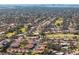 Aerial view of a residential community situated near a golf course and coastline at 2321 Beneva Ter # 2288, Sarasota, FL 34232