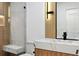 Modern bathroom with a floating vanity, marble countertop, and frameless shower at 2321 Beneva Ter # 2288, Sarasota, FL 34232