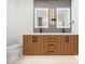 Double vanity bathroom with marble countertop and wood cabinets at 2321 Beneva Ter # 2288, Sarasota, FL 34232