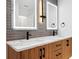 Double vanity bathroom with marble countertop and sleek fixtures at 2321 Beneva Ter # 2288, Sarasota, FL 34232