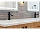 Modern double vanity with marble countertops and sleek black faucets at 2321 Beneva Ter # 2288, Sarasota, FL 34232