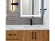 Modern bathroom vanity with marble countertop and black faucets at 2321 Beneva Ter # 2288, Sarasota, FL 34232
