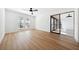 Spacious bedroom featuring light wood floors and access to balcony at 2321 Beneva Ter # 2288, Sarasota, FL 34232