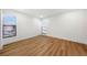 Well-lit bedroom with light wood floors and window coverings at 2321 Beneva Ter # 2288, Sarasota, FL 34232