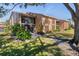 Condo building exterior showcasing landscaping and architecture at 2321 Beneva Ter # 2288, Sarasota, FL 34232