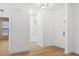 Clean and modern hallway with updated flooring and doors at 2321 Beneva Ter # 2288, Sarasota, FL 34232