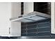Stainless steel range hood in a modern kitchen at 2321 Beneva Ter # 2288, Sarasota, FL 34232
