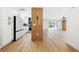 Modern kitchen with white cabinets, marble countertops, and stainless steel appliances at 2321 Beneva Ter # 2288, Sarasota, FL 34232