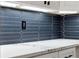 Kitchen detail featuring blue and white backsplash at 2321 Beneva Ter # 2288, Sarasota, FL 34232