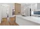 Modern kitchen with white cabinets and marble countertops at 2321 Beneva Ter # 2288, Sarasota, FL 34232