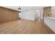 Open living area with wood floors and wood wall accent at 2321 Beneva Ter # 2288, Sarasota, FL 34232