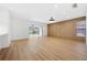 Modern living room featuring wood floors and wood slat wall at 2321 Beneva Ter # 2288, Sarasota, FL 34232