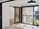 Sunroom with sliding glass doors, view of patio, and light walls at 2321 Beneva Ter # 2288, Sarasota, FL 34232