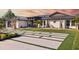 White modern home with metal roof and landscaped yard at 2350 Via Venice, Punta Gorda, FL 33950