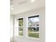 Bright room with two large windows offering scenic views at 2350 Via Venice, Punta Gorda, FL 33950