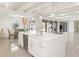 Modern kitchen with island and breakfast bar, open to living area at 2350 Via Venice, Punta Gorda, FL 33950