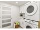 Laundry room with washer, dryer, and cabinets at 2350 Via Venice, Punta Gorda, FL 33950