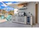 Stainless steel outdoor kitchen with built in grill and beverage cooler at 2350 Via Venice, Punta Gorda, FL 33950