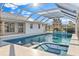 Luxury pool and spa with covered patio and canal views at 2350 Via Venice, Punta Gorda, FL 33950