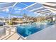 Inviting pool with a covered patio overlooking the canal at 2350 Via Venice, Punta Gorda, FL 33950