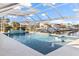 Relaxing pool area overlooking a peaceful canal with boats at 2350 Via Venice, Punta Gorda, FL 33950