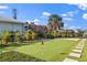 Enjoy your own putting green with landscaping at 2350 Via Venice, Punta Gorda, FL 33950