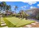 Landscaped backyard with a putting green at 2350 Via Venice, Punta Gorda, FL 33950