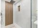 Walk-in shower with wood-like tile and rain shower head at 2350 Via Venice, Punta Gorda, FL 33950