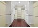 Walk-in closet with built-in shelving and drawers for optimal organization at 2500 Jamaica St, Sarasota, FL 34231