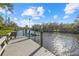This private dock features a boat lift for convenient water access and maintenance at 2500 Jamaica St, Sarasota, FL 34231