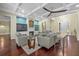 Cozy living room with a fireplace, built-in shelving, and elegant decor at 2500 Jamaica St, Sarasota, FL 34231
