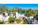 Condo community with waterfront access and tropical landscaping at 307 Timberlake Dr # 307, Bradenton, FL 34210