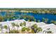 Aerial view of waterfront community with lush landscaping and canal at 307 Timberlake Dr # 307, Bradenton, FL 34210